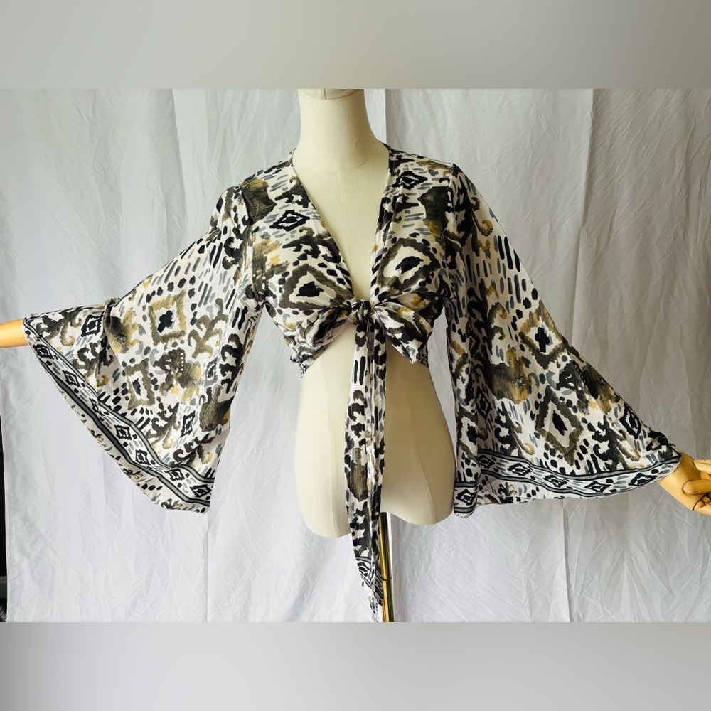 Chic Patterned Wrap Blouse With Bell Sleeves - image 2